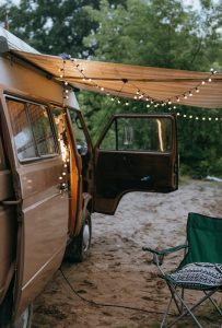 camper van with an awning installed on the side