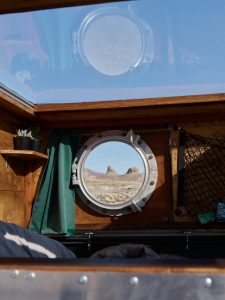 Camper van with porthole window installed